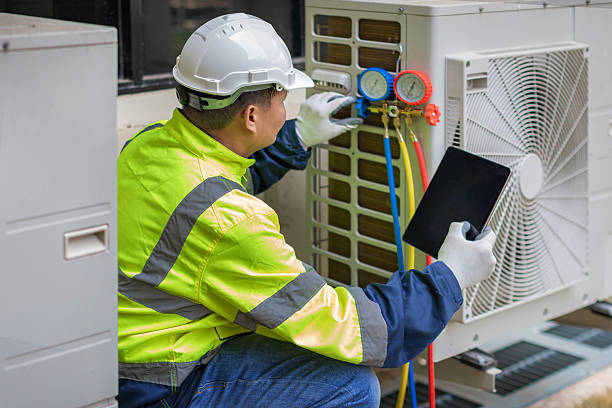 Professional Hvac Installation technician working in Puryear, TN